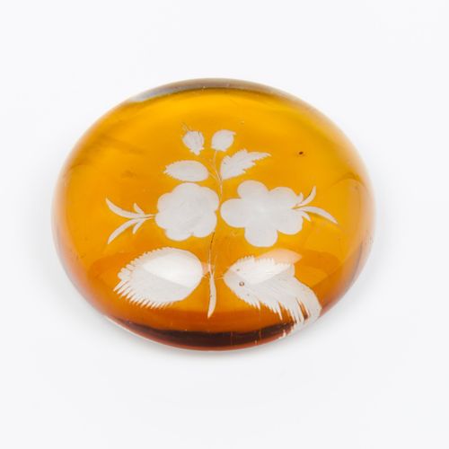 Null A paperweight
Amber coloured glass paste

Engraved floral decoration

Franc&hellip;