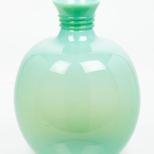 Null A large vase
Green moulded glass

Striated decoration to neck

Marked "DAUM&hellip;