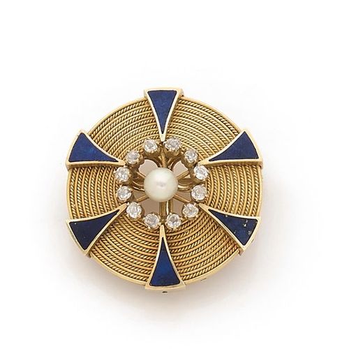 Null 

Broche ronde en or jaune 18K (750) constituée d'anneaux concentriques lis&hellip;