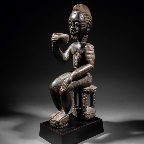 Null Seated Baule figure
Ivory Coast
Wood
H. 49 cm

Baule seated figure, Ivory C&hellip;