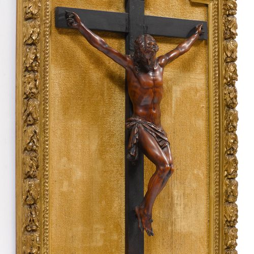 Null CRUCIFIX IN A CARVED FRAME
France, beginning of the 18th century.
The body &hellip;