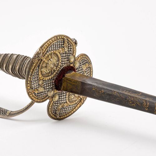Null GALADEGEN
法国，巴黎1774年，Laurent Dépé大师。
银质刀柄，由铸造和锻造的部件组成，部分镀金。橄榄形的鞍座，铆钉头，握弓结束于&hellip;