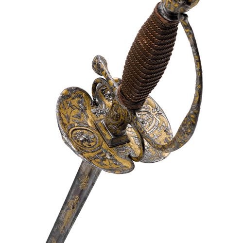 Null GALADEGEN
法国，约1750年，Jacques Antoine Piguet，巴黎。
铁制剑柄，由铸造、锻造部件组成，部分镀金。球形鞍座，铆钉&hellip;