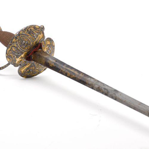 Null GALADEGEN
法国，约1750年，Jacques Antoine Piguet，巴黎。
铁制剑柄，由铸造、锻造部件组成，部分镀金。球形鞍座，铆钉&hellip;