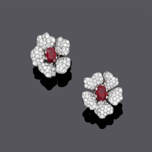 Null RUBY AND DIAMOND EARCLIPS, ca. 1980.
Platinum 950, 19g.
Each centering upon&hellip;