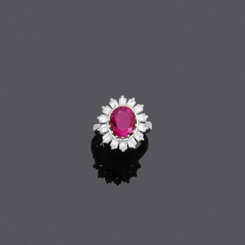 Null BURMA RUBY AND DIAMOND RING, ca. 1970.
White gold 750, 11g.
Set with 1 roun&hellip;