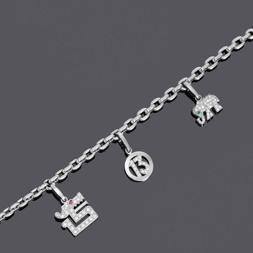 Null DIAMOND AND GOLD CHARMS BRACELET, BY CARTIER.
White gold 750, 25g.
Model Ch&hellip;