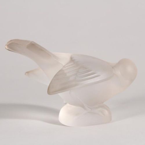 Null LALIQUE France

 "Oiseau"

Sujet en cristal moulé et dépoli

L.: 11,5 cm