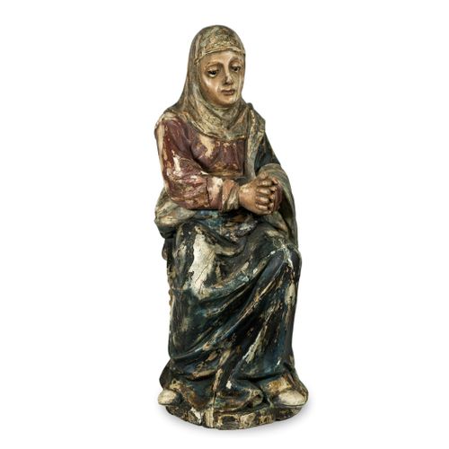 Null 西班牙学校，18世纪。

圣安妮。

雕刻、多色和镀金的木材雕塑。

70 x 27 x 25厘米。