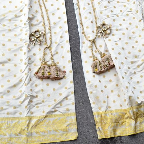 Two Pair of cream and gold silk curtains decorated with discs. Border with folia&hellip;