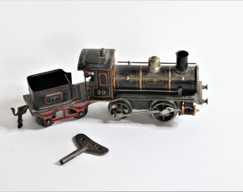 Null MARKLIN "O" 1910

Locomotive mécanique 020 en tôle peinte avec tender à 2 e&hellip;