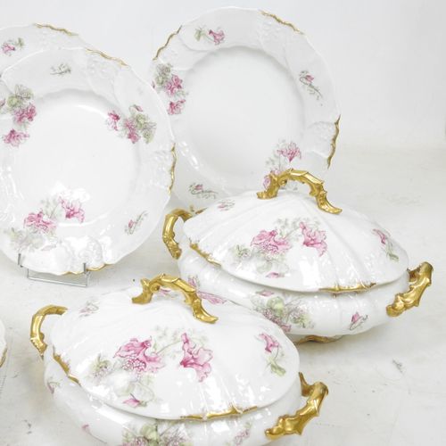 Null LIMOGES: Part of a porcelain dinner service decorated with pink cyclamen, c&hellip;