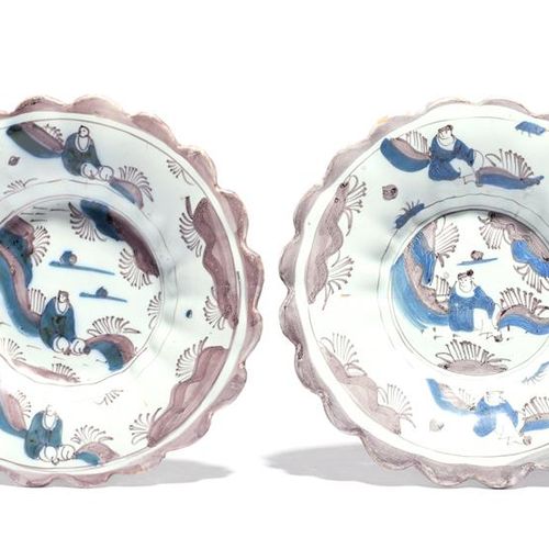 Null Two small Delft lobed plates c.1690, each painted in blue and manganese wit&hellip;