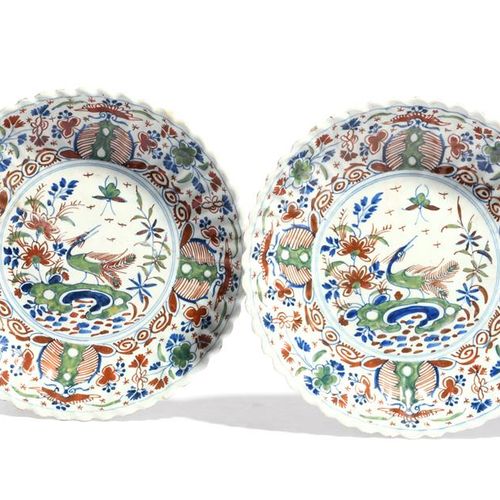 Null A pair of delftware plates or dishes c.1720-30, of shallow crimped form, pa&hellip;