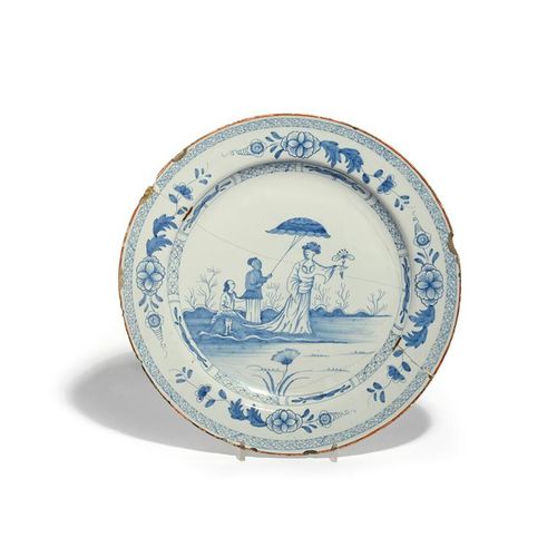 Null A large Liverpool delftware 'Dame au Parasol' plate c.1760, painted in blue&hellip;