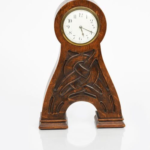 Null An Art Nouveau Liberty & Co Romsdal oak mantle clock, the tapering body car&hellip;