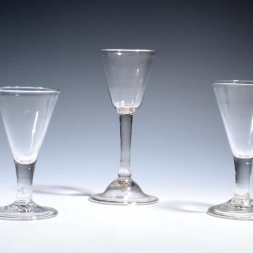 Null Three wine glasses c.1740-50, one with a round funnel bowl on a plain stem &hellip;