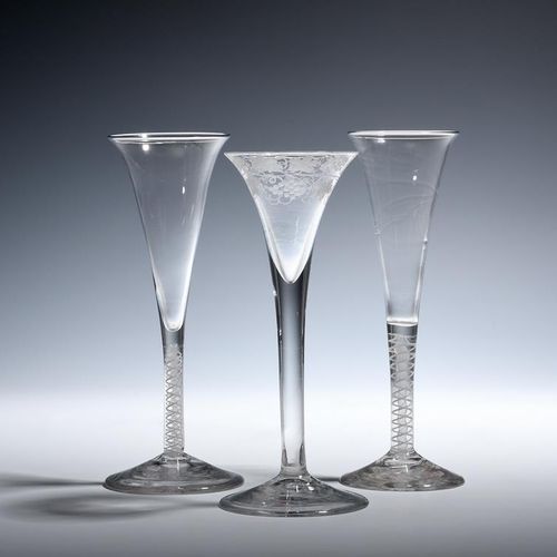 Null Two wine flutes c.1760, the slender drawn trumpet bowls with everted rims, &hellip;