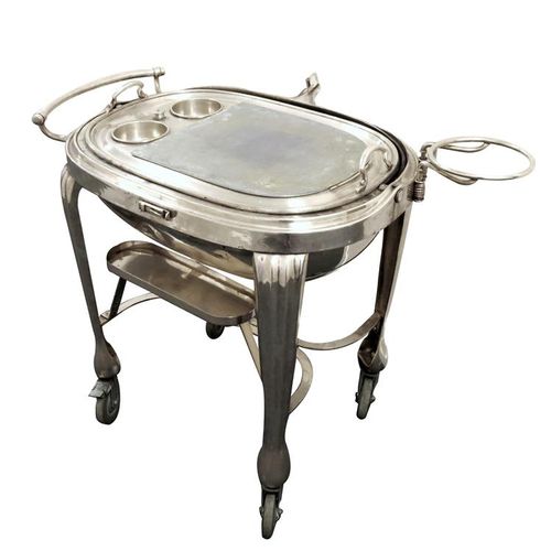 Null An electroplated meat wagon, by Drakes of London, oblong form, revolving hi&hellip;