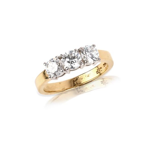 Null A diamond three stone ring, set with three round brilliant-cut diamonds in &hellip;
