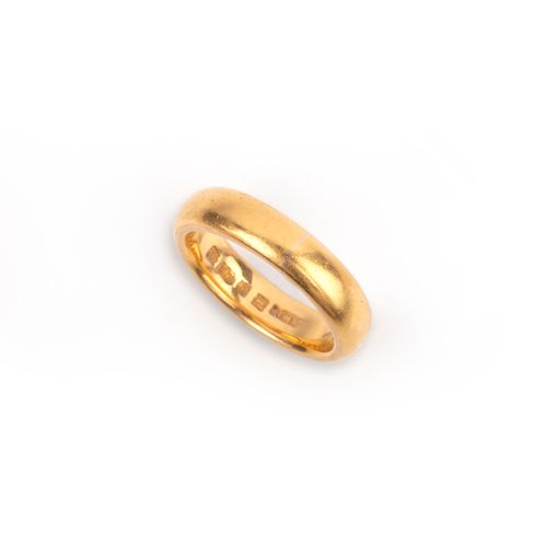 Null A 22ct gold wedding ring, circa 1926, the plain polished band of "D" sectio&hellip;