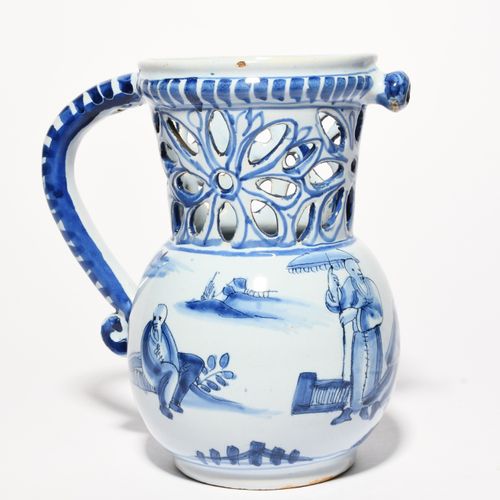 Null An unusual Delft puzzle jug, 18th century, the globular body painted in blu&hellip;