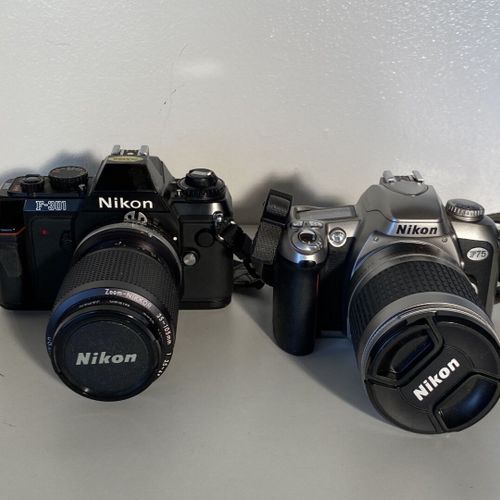 Un lot d'appareils photo NIKON F3 (2,8/55) F301 (35x105) F(2/50) F75 (28x100) En&hellip;
