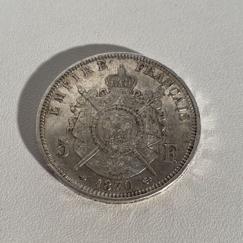 Une pièce de 5 Fr Francs en argent datée de 1870 PB : 24.91 g Mise à prix : 10 e&hellip;