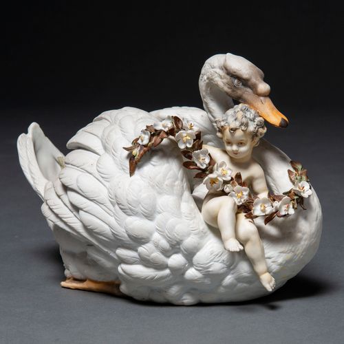 Null Centerpiece in the form of swan carrying a child with garland of flowers in&hellip;