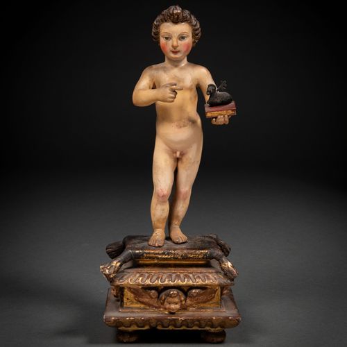 Null "施洗者圣约翰 "圆雕，多色木雕。西班牙作品，18世纪。
，它放置在一个木制的底座上，上面装饰着带翅膀的小天使，上面有涂鸦和estofados。

捧&hellip;