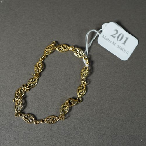 Null 201- Bracelet en or filigrane

Pds : 3,40 g