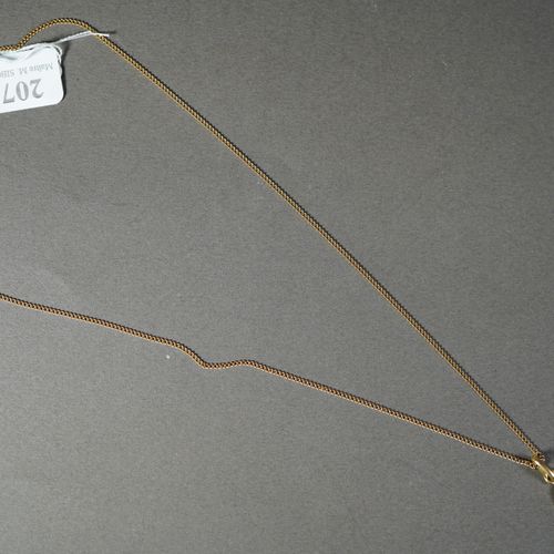 Null 207- Chaîne en or et son pendentif ''poupée Ashanti''

Pds : 5,80 g