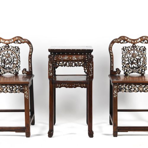 A pair of rosewood armchairs inlaid with mother-of-pearl and a hocker. China, Pe&hellip;