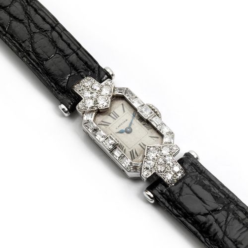 Art déco-Armband und -Uhr von Cartier 手镯长度：约16.5厘米。 

宽度：约1.6厘米。 

重量：约37.4克。 

&hellip;