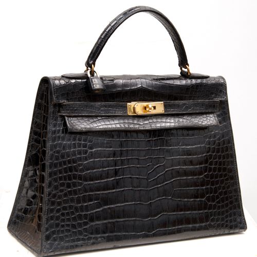 HERMES Handbag brand Hermes, Kelly model in black crocodile leather. In good con&hellip;
