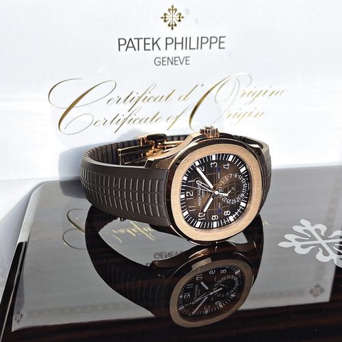 Patek Philippe Nahezu neuwertige Genfer Armbanduhr mit Zwei-Zeitzonen Anzeige un&hellip;