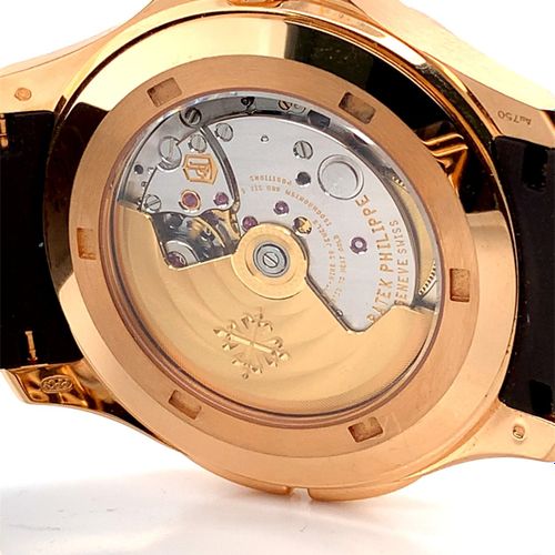 Patek Philippe Nahezu neuwertige Genfer Armbanduhr mit Zwei-Zeitzonen Anzeige un&hellip;