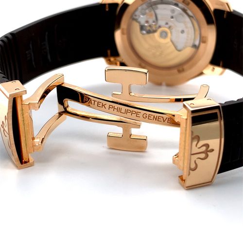 Patek Philippe Nahezu neuwertige Genfer Armbanduhr mit Zwei-Zeitzonen Anzeige un&hellip;