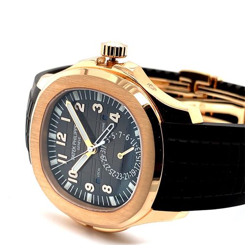 Patek Philippe Nahezu neuwertige Genfer Armbanduhr mit Zwei-Zeitzonen Anzeige un&hellip;