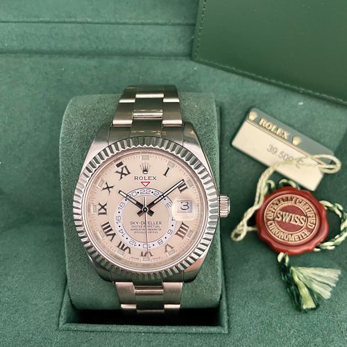 Rolex A very attractive wristwatch with date, annual calendar and second time zo&hellip;