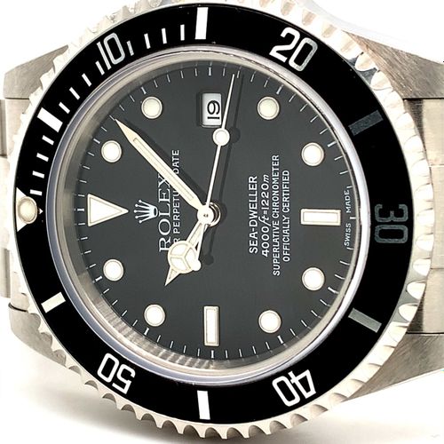 Rolex (*) An attractive diving wristwatch with date - with original box, origina&hellip;