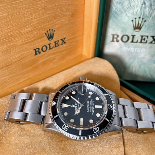 Rolex (*) A diver's very sought after vintage wristwatch with date and original &hellip;
