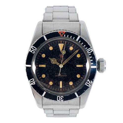 Rolex (*) 极其罕见的、富有魅力的复古潜水员腕表，带有大上链表冠和保存完好的 "大标志 "钢制表带。这个标本以一个保存完好的版本出现，具有高度吸引力，迷&hellip;
