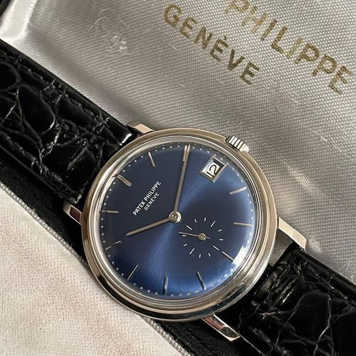 Patek Philippe 非常有吸引力的日内瓦古董腕表，带日期和原包装盒

，机芯编号1128997，型号3445，机芯27-460M，表壳编号326221&hellip;