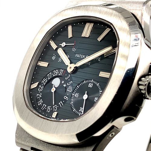 Patek Philippe A sporty Geneva wristwatch with moon phases, analog date and powe&hellip;