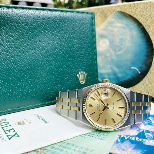 Rolex 罕见的复古双色腕表，带日期和精密石英机芯的第一系列，带有原包装盒、小册子、手册和1979年的劳力士保修维修收据

，机芯编号0013517，编号17&hellip;