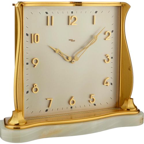 Null Imhof table clock. Gilded brass case, stone base. Bright signed dial with g&hellip;