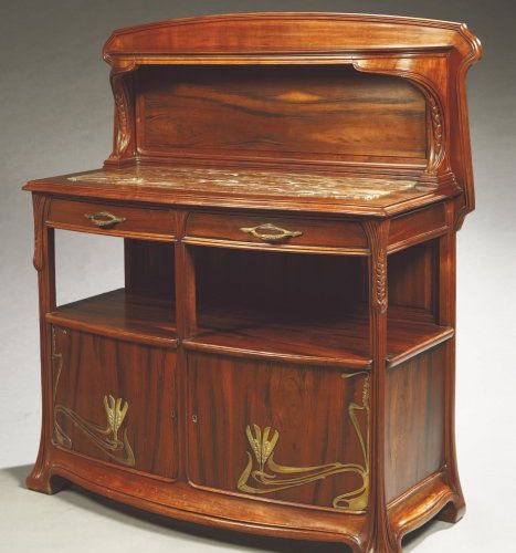Louis MAJORELLE (1859-1926) Desserte-dressoir sculptée d'épis de blé. Structure &hellip;