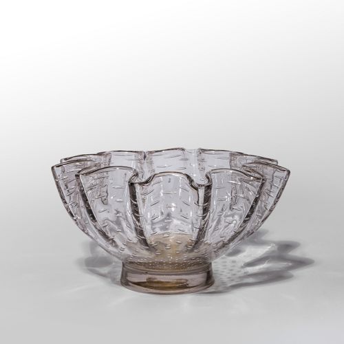 BAROVIER ERCOLE BAROVIER & TOSO ERCOLE BAROVIER & TOSO 一个透明的玻璃碗，有波浪形的边缘，包括有规律的气泡&hellip;