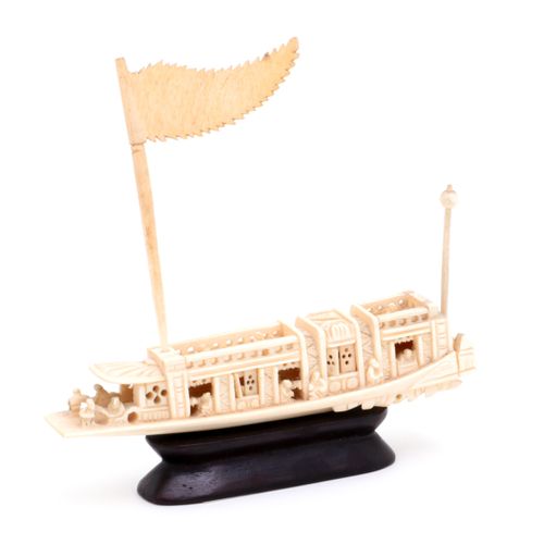 AN ORIENTAL BOAT AN ORIENTAL BOAT Profusely carved and pierced ivory, with sever&hellip;